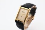 Refurbished Vintage Seiko Slim Tank Men's Wrist Watch Gold Dial With Black Strap - Image 2
